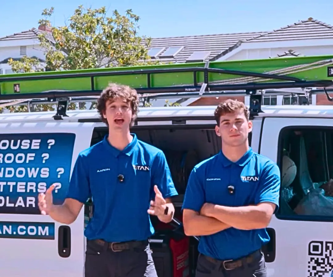 Aaron and Conor from Titan in front of the Titan van