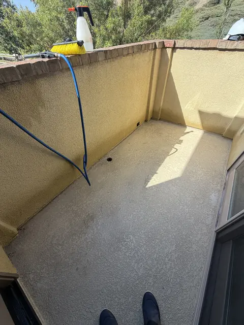 Balcony deck after cleaning, photo by Katie W.