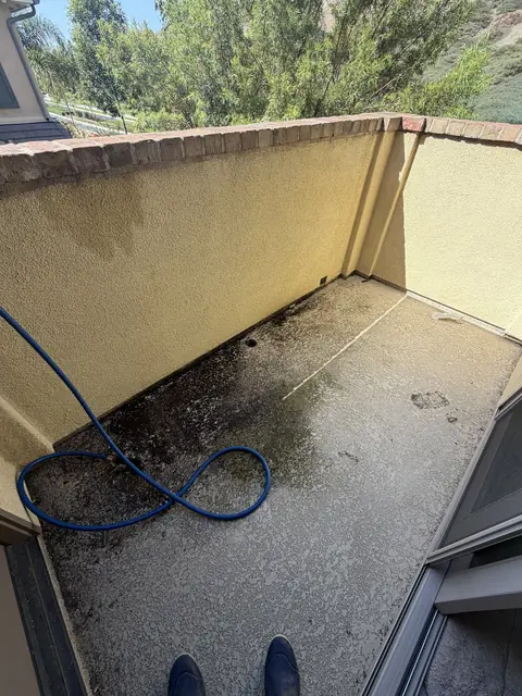 Balcony deck before cleaning, photo by Katie W.